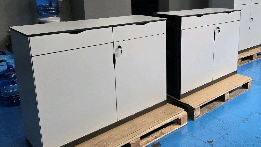 Custom low-profile credenzas with concealed-pull doors