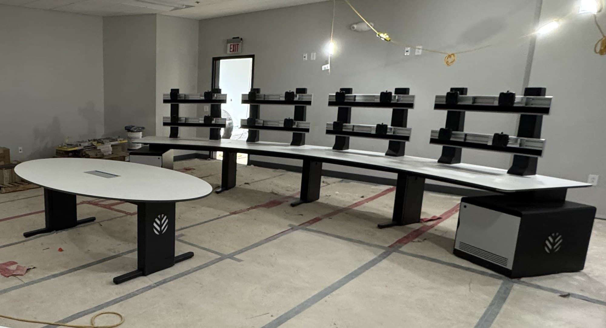 Elite Slatwall console — continuous aluminum rail system in a live install