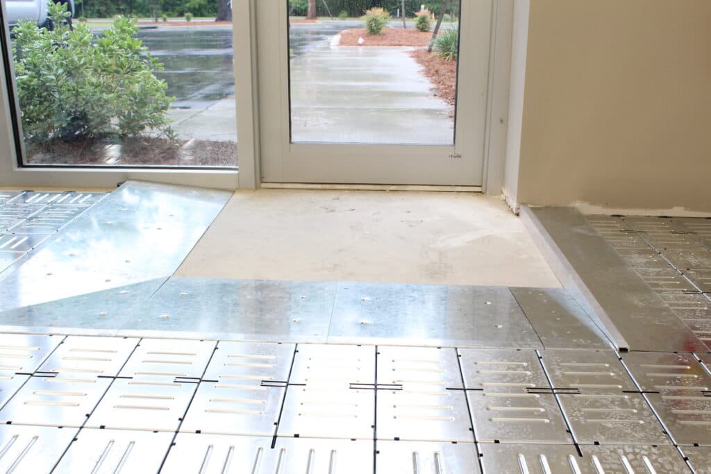 Raised access floor system installation in progress